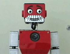 Красный робот корчит квадратные рожи