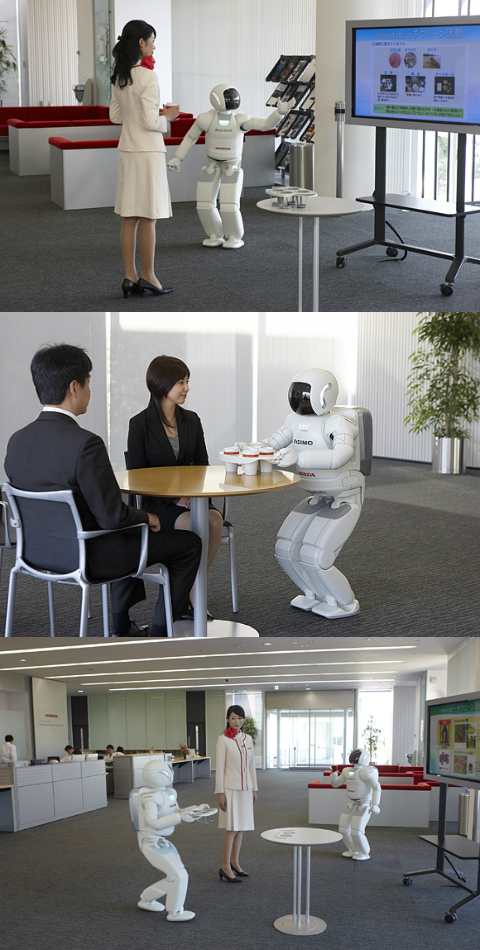 фото робота Асимо на презентации в Японии